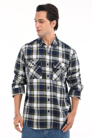 Man wearing a plaid shirt with a white background