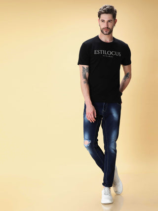 Midnight Black Crew Neck T-Shirt shop online at Estilocus. This pure cotton printed T-shirt is a stylish go-to for laidback days. Cut in a comfy regular fit. • 100% Cotton knitted interlock 190GSM• Bio washed fabric• Round neck T-shirt • Half sleeve • Sui