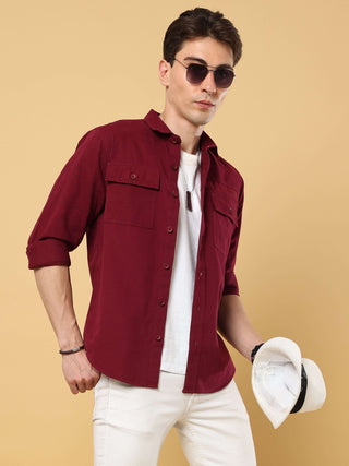 Wine Maroon Twill Solid Cargo Shirt shop online at Estilocus. • 100% premium cotton• Full-sleeve solid shirt• Cut and sew placket• Regular collar• Double button round cuff's.• Double pocket with flap.• Finest embroidery on sleeve and front panel• Curved h