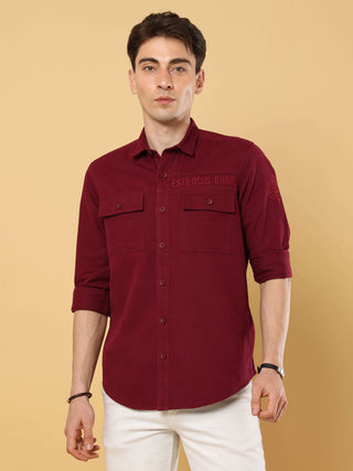 Wine Maroon Twill Solid Cargo Shirt shop online at Estilocus. • 100% premium cotton• Full-sleeve solid shirt• Cut and sew placket• Regular collar• Double button round cuff's.• Double pocket with flap.• Finest embroidery on sleeve and front panel• Curved h