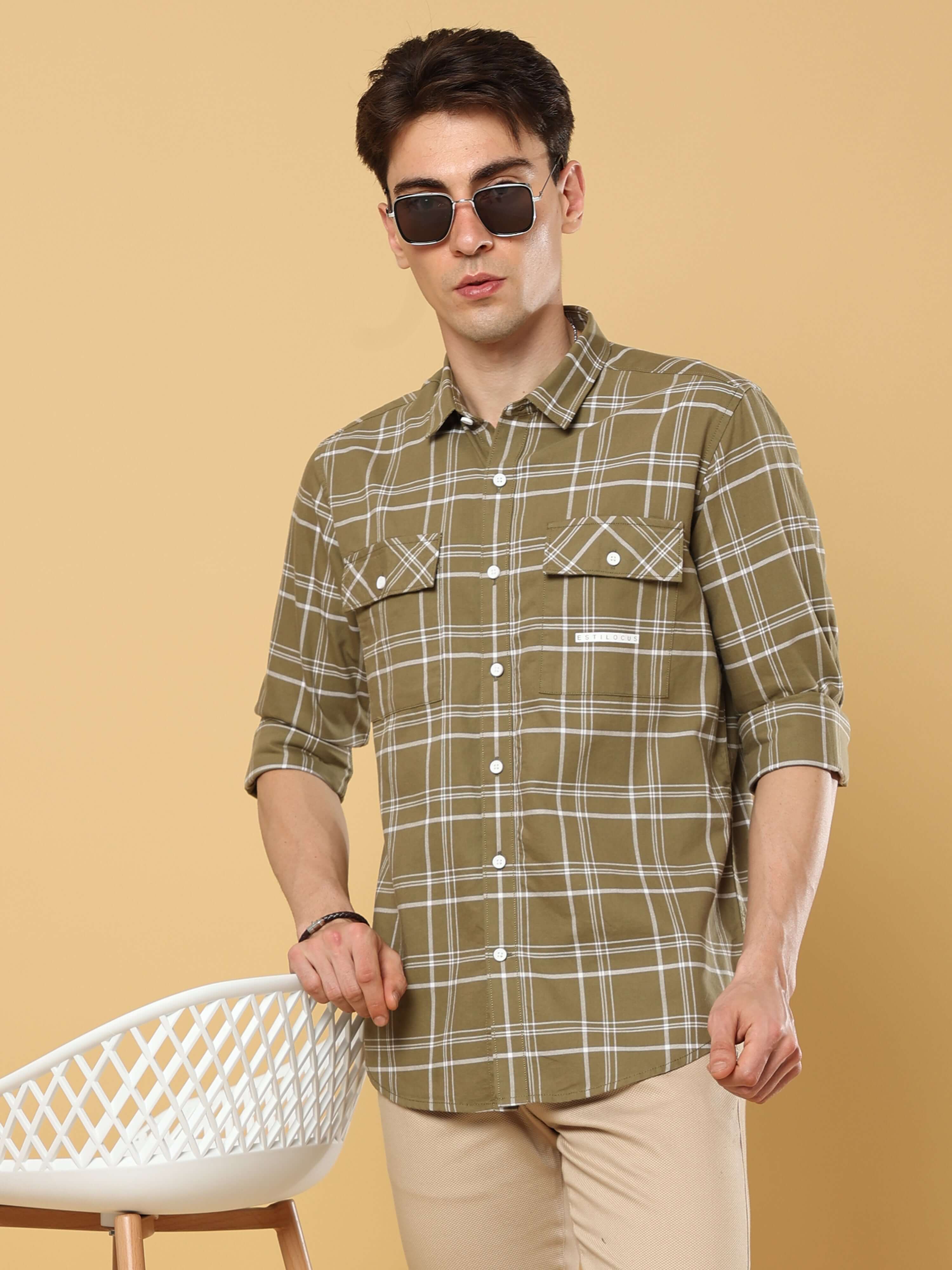 Ochre Green Solid Double Pocket Shirt shop online at Estilocus. • 100% premium cotton• Full-sleeve check shirt• All over print pattern• Regular collar• Double button round cuff's.• Double pocket with flap• Curved hemline• All single needle construction, f