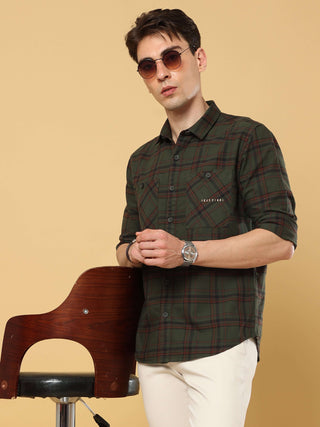 Green Check Double Pocket Shirt shop online at Estilocus. • 100% premium cotton• Full-sleeve check shirt• Cut and sew placket• Regular collar• Double button round cuff's.• Double pocket flapless pocket• Curved hemline• All single needle construction, fine