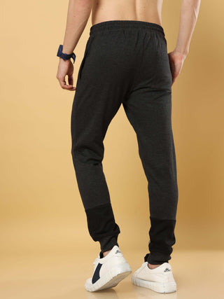 Grey Joggers With Adjustable Draw String shop online at Estilocus. •High GSM knitted breathable fabric. •Elastic waistband with an adjustable drawcord secures your fit • Bottom rib with patchwork fabric with finest quality print unique design. • Insert po