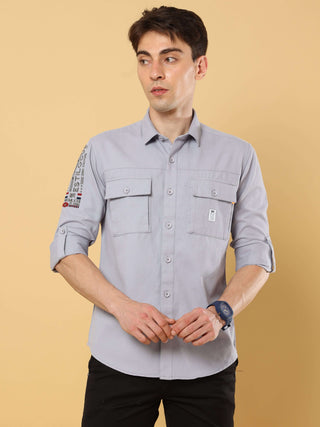 Double Pocket Cargo Casual Full Sleeve Shirt shop online at Estilocus. • 100% premium cotton• Full-sleeve solid shirt• Cut and sew placket• Regular collar• Double button square cuff.• Double pocket with flap.• Finest signature embroidery on the sleeve.• C