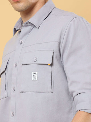 Double Pocket Cargo Casual Full Sleeve Shirt shop online at Estilocus. • 100% premium cotton• Full-sleeve solid shirt• Cut and sew placket• Regular collar• Double button square cuff.• Double pocket with flap.• Finest signature embroidery on the sleeve.• C