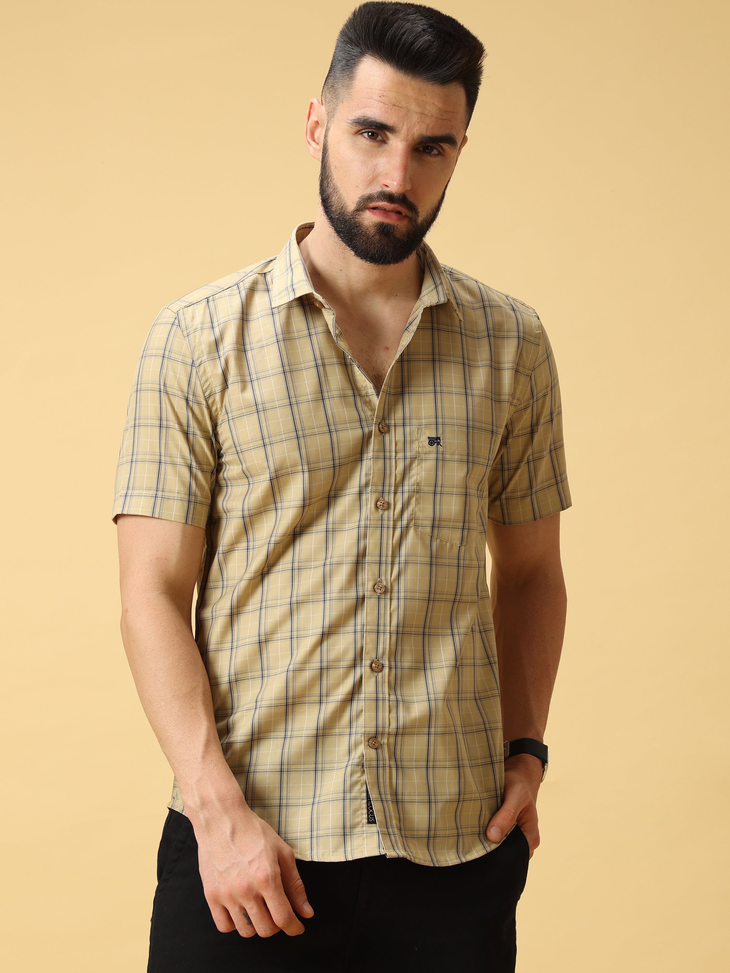Cream Navy Check Half sleeve Shirt shop online at Estilocus. • Half-sleeve check shirt• Cut and sew placket• Regular collar• Double button square cuff.• Single pocket with logo embroidery• Curved hemline• Finest quality sewing• Machine wash care• Suitable