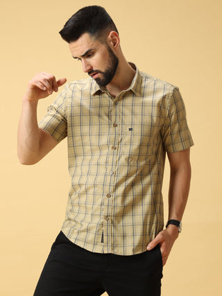 Cream Navy Check Half sleeve Shirt shop online at Estilocus. • Half-sleeve check shirt• Cut and sew placket• Regular collar• Double button square cuff.• Single pocket with logo embroidery• Curved hemline• Finest quality sewing• Machine wash care• Suitable