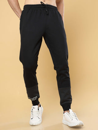 Joggers With Adjustable Draw String shop online at Estilocus. •High GSM knitted breathable fabric. •Elastic waistband with an adjustable drawcord secures your fit • Bottom rib with patchwork fabric with finest quality print unique design. • Insert pocket