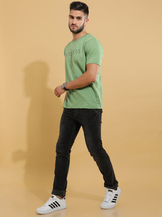 Green Crewneck T-Shirt shop online at Estilocus. This pure cotton printed T-shirt is a stylish go-to for laidback days. Cut in a comfy regular fit. • 100% Cotton knitted interlock 190GSM• Bio washed fabric• Round neck T-shirt • Half sleeve • Suits to wear