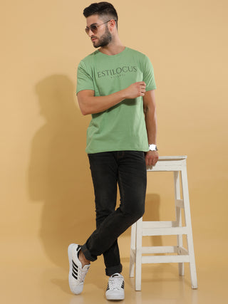 Green Crewneck T-Shirt shop online at Estilocus. This pure cotton printed T-shirt is a stylish go-to for laidback days. Cut in a comfy regular fit. • 100% Cotton knitted interlock 190GSM• Bio washed fabric• Round neck T-shirt • Half sleeve • Suits to wear