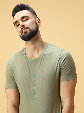 Unstoppable Green Print Crew Neck T-Shirt shop online at Estilocus. This pure cotton printed T-shirt is a stylish go-to for laidback days. Cut in a comfy regular fit. • 100% Cotton knitted interlock 190GSM• Bio washed fabric• Round neck T-shirt • Half sle