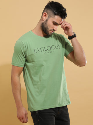 Green Crewneck T-Shirt shop online at Estilocus. This pure cotton printed T-shirt is a stylish go-to for laidback days. Cut in a comfy regular fit. • 100% Cotton knitted interlock 190GSM• Bio washed fabric• Round neck T-shirt • Half sleeve • Suits to wear