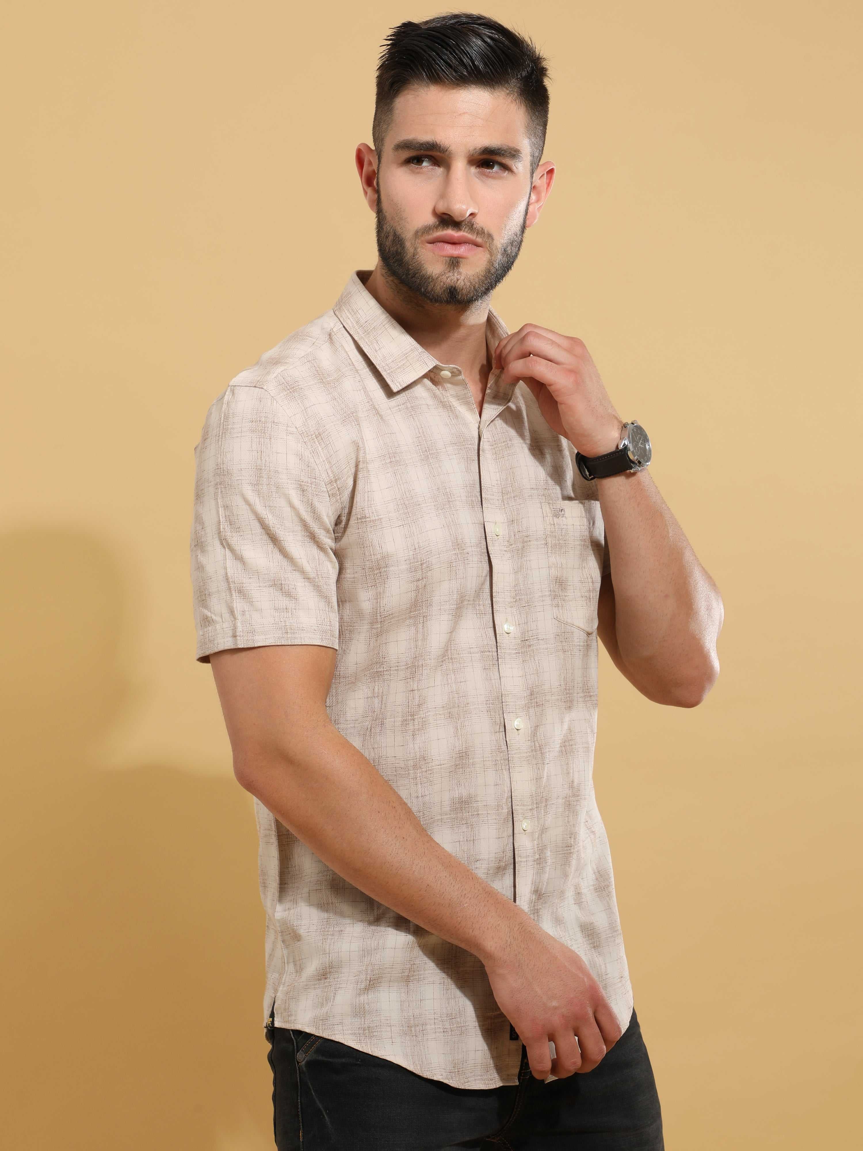 Brownish Checks half sleeve shirt | Men's Shirt shop online at Estilocus. Buy Brownish Checks half sleeve shirt in different sizes and colors online. Shop For Mens Wear with a wide range of Brand New Collections in latest styles only at ESTILOCUS. *Free S