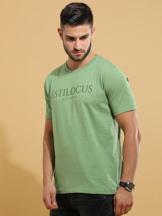 Green Crewneck T-Shirt shop online at Estilocus. This pure cotton printed T-shirt is a stylish go-to for laidback days. Cut in a comfy regular fit. • 100% Cotton knitted interlock 190GSM• Bio washed fabric• Round neck T-shirt • Half sleeve • Suits to wear