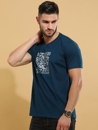 Teal Barcode Crewneck T-Shirt shop online at Estilocus. This pure cotton printed T-shirt is a stylish go-to for laidback days. Cut in a comfy regular fit. • 100% Cotton knitted interlock 190GSM• Bio washed fabric• Round neck T-shirt • Half sleeve • Suits