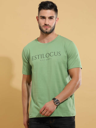 Green Crewneck T-Shirt shop online at Estilocus. This pure cotton printed T-shirt is a stylish go-to for laidback days. Cut in a comfy regular fit. • 100% Cotton knitted interlock 190GSM• Bio washed fabric• Round neck T-shirt • Half sleeve • Suits to wear