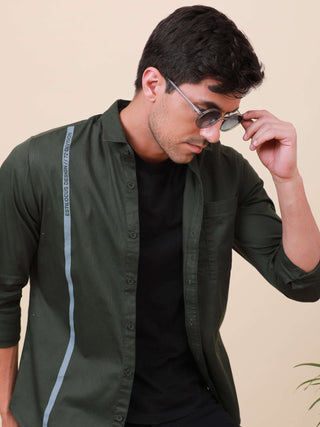 Dark Green Solid Single Pocket full sleeve shirt shop online at Estilocus. 100% Cotton ,Full-sleeve solid shirt Cut and sew placket Regular collar Double button edge cuff Single pocket with flap Curved bottom hemline Finest printing at front placket. All