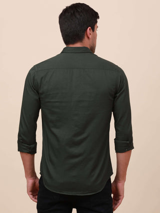 Dark Green Solid Single Pocket full sleeve shirt shop online at Estilocus. 100% Cotton ,Full-sleeve solid shirt Cut and sew placket Regular collar Double button edge cuff Single pocket with flap Curved bottom hemline Finest printing at front placket. All