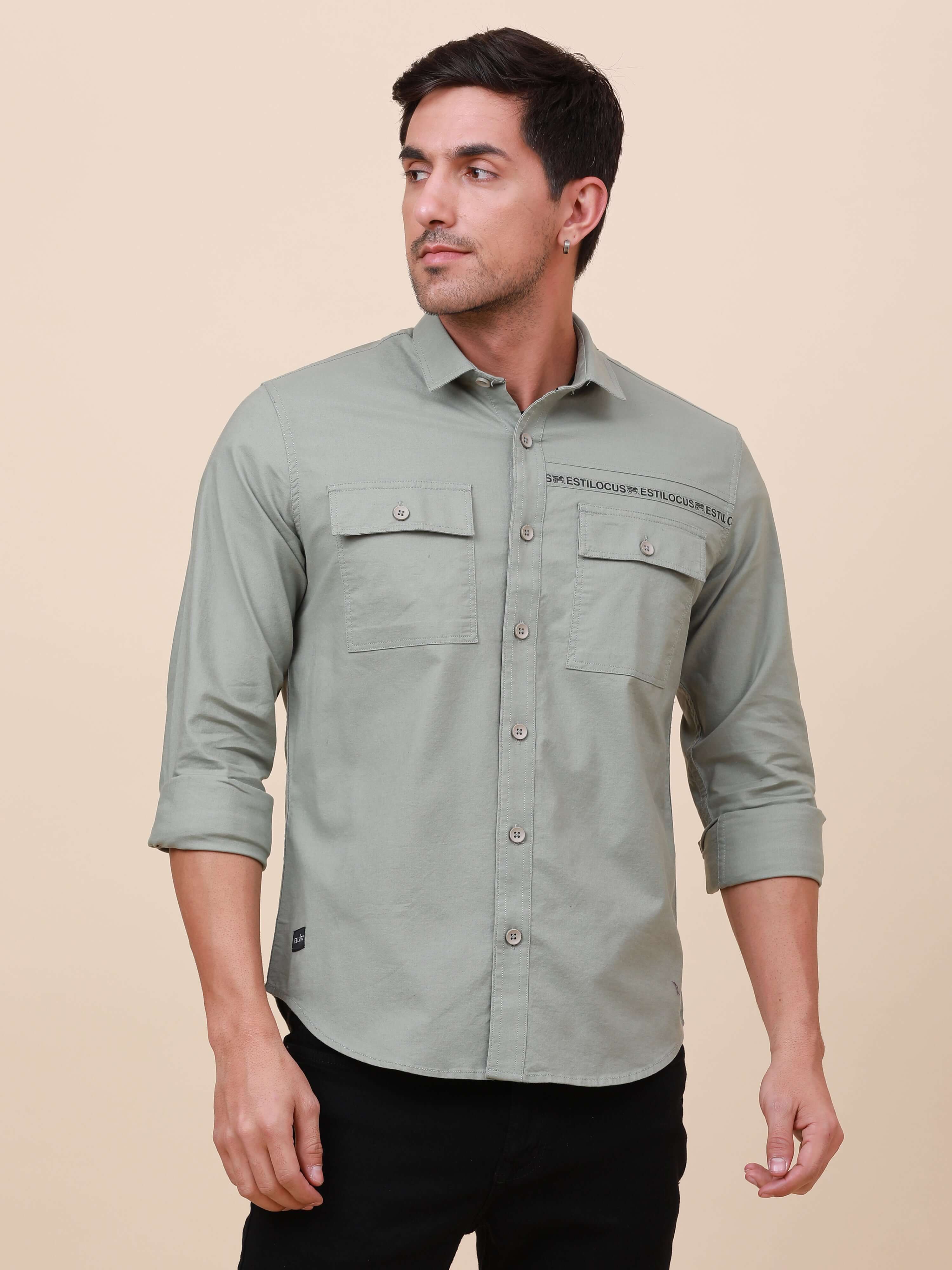 Olive Solid Double Pocket Shirt shop online at Estilocus. 100% Cotton , Full-sleeve solid shirt Cut and sew placket Regular collar Double button edge cuff Double pocket with flap Curved bottom hemline Finest printing at front placket. All double needle co