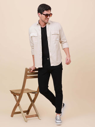 Beige Solid Double Pocket Full-Sleeve Shirt shop online at Estilocus. 100% Cotton , Full-sleeve solid shirt Cut and sew placket Regular collar Double button edge cuff Double pocket with flap Curved bottom hemline Finest printing at pocket . All double nee