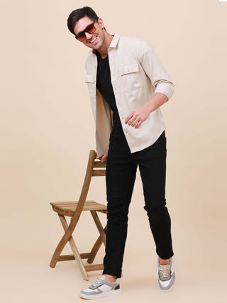 Beige Solid Double Pocket Full-Sleeve Shirt shop online at Estilocus. 100% Cotton , Full-sleeve solid shirt Cut and sew placket Regular collar Double button edge cuff Double pocket with flap Curved bottom hemline Finest printing at pocket . All double nee