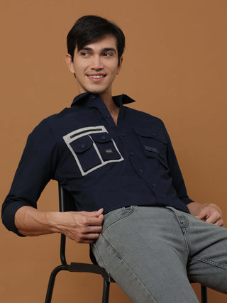 Etls/72 Cargo Navy Shirt shop online at Estilocus. 100% Premium peach Cotton Full-sleeve solid shirt Cut and sew placket Contrast patch @ Front panel pocket Regular collar Double button edge cuff Double cargo pocket along with zipper pocket and single car