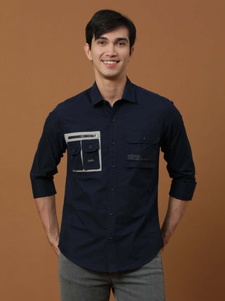 Etls/72 Cargo Navy Shirt shop online at Estilocus. 100% Premium peach Cotton Full-sleeve solid shirt Cut and sew placket Contrast patch @ Front panel pocket Regular collar Double button edge cuff Double cargo pocket along with zipper pocket and single car