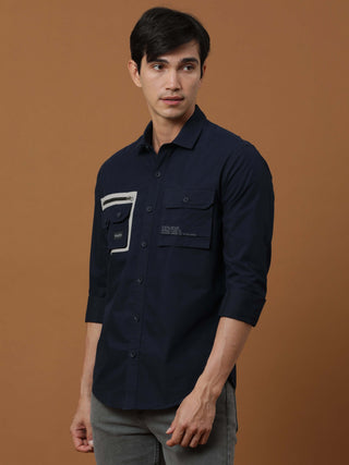 Etls/72 Cargo Navy Shirt shop online at Estilocus. 100% Premium peach Cotton Full-sleeve solid shirt Cut and sew placket Contrast patch @ Front panel pocket Regular collar Double button edge cuff Double cargo pocket along with zipper pocket and single car