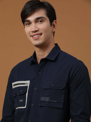 Etls/72 Cargo Navy Shirt shop online at Estilocus. 100% Premium peach Cotton Full-sleeve solid shirt Cut and sew placket Contrast patch @ Front panel pocket Regular collar Double button edge cuff Double cargo pocket along with zipper pocket and single car