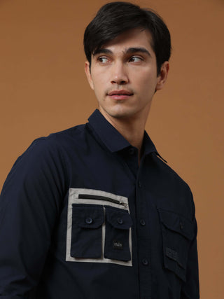 Etls/72 Cargo Navy Shirt shop online at Estilocus. 100% Premium peach Cotton Full-sleeve solid shirt Cut and sew placket Contrast patch @ Front panel pocket Regular collar Double button edge cuff Double cargo pocket along with zipper pocket and single car