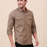 Khaki Solid Double Pocket Shirt shop online at Estilocus. 100% Cotton , Full-sleeve solid shirt Cut and sew placket Regular collar Double button edge cuff Double pocket with flap Curved bottom hemline Finest printing at front placket. All double needle co