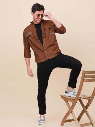 Coffee Brown Solid Double Pocket Shirt shop online at Estilocus. 100% Cotton , Full-sleeve solid shirt Cut and sew placket Regular collar Double button edge cuff Double pocket with flap Curved bottom hemline Finest printing at pocket . All double needle c