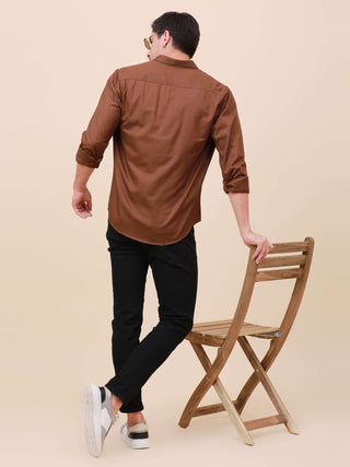 Coffee Brown Solid Double Pocket Shirt shop online at Estilocus. 100% Cotton , Full-sleeve solid shirt Cut and sew placket Regular collar Double button edge cuff Double pocket with flap Curved bottom hemline Finest printing at pocket . All double needle c