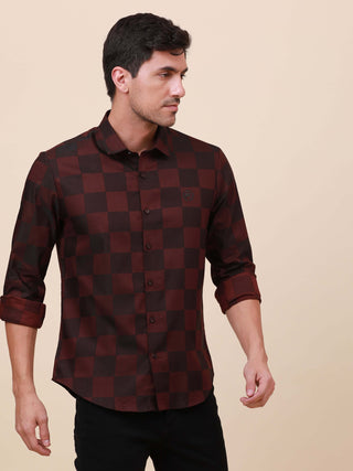 Maroon Check Pocketless Shirt shop online at Estilocus. 100% Cotton ,Full-sleeve checks shirt Self fold placket Regular collar Double button edge cuff Pocketless Curved bottom hemline Finest quality brand embroidery at front placket. All single needle con