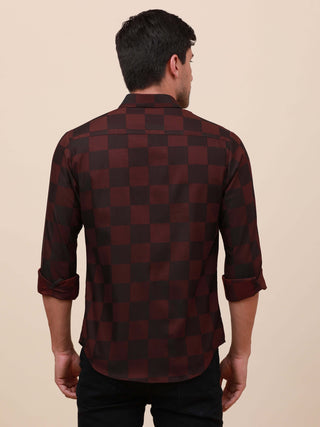 Maroon Check Pocketless Shirt shop online at Estilocus. 100% Cotton ,Full-sleeve checks shirt Self fold placket Regular collar Double button edge cuff Pocketless Curved bottom hemline Finest quality brand embroidery at front placket. All single needle con