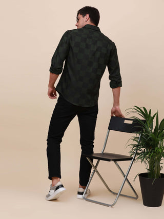 Green Check Pocketless Shirt shop online at Estilocus. 100% Cotton ,Full-sleeve checks shirt Self fold placket Regular collar Double button edge cuff Pocketless Curved bottom hemline Finest quality brand embroidery at front placket. All single needle cons