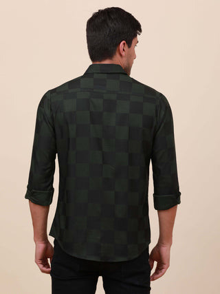 Green Check Pocketless Shirt shop online at Estilocus. 100% Cotton ,Full-sleeve checks shirt Self fold placket Regular collar Double button edge cuff Pocketless Curved bottom hemline Finest quality brand embroidery at front placket. All single needle cons