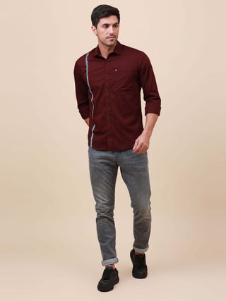 Plum Solid Single Pocket Shirt shop online at Estilocus. 100% Cotton ,Full-sleeve solid shirt Cut and sew placket Regular collar Double button edge cuff Single pocket Curved bottom hemline Finest printing at front placket. All double needle construction,