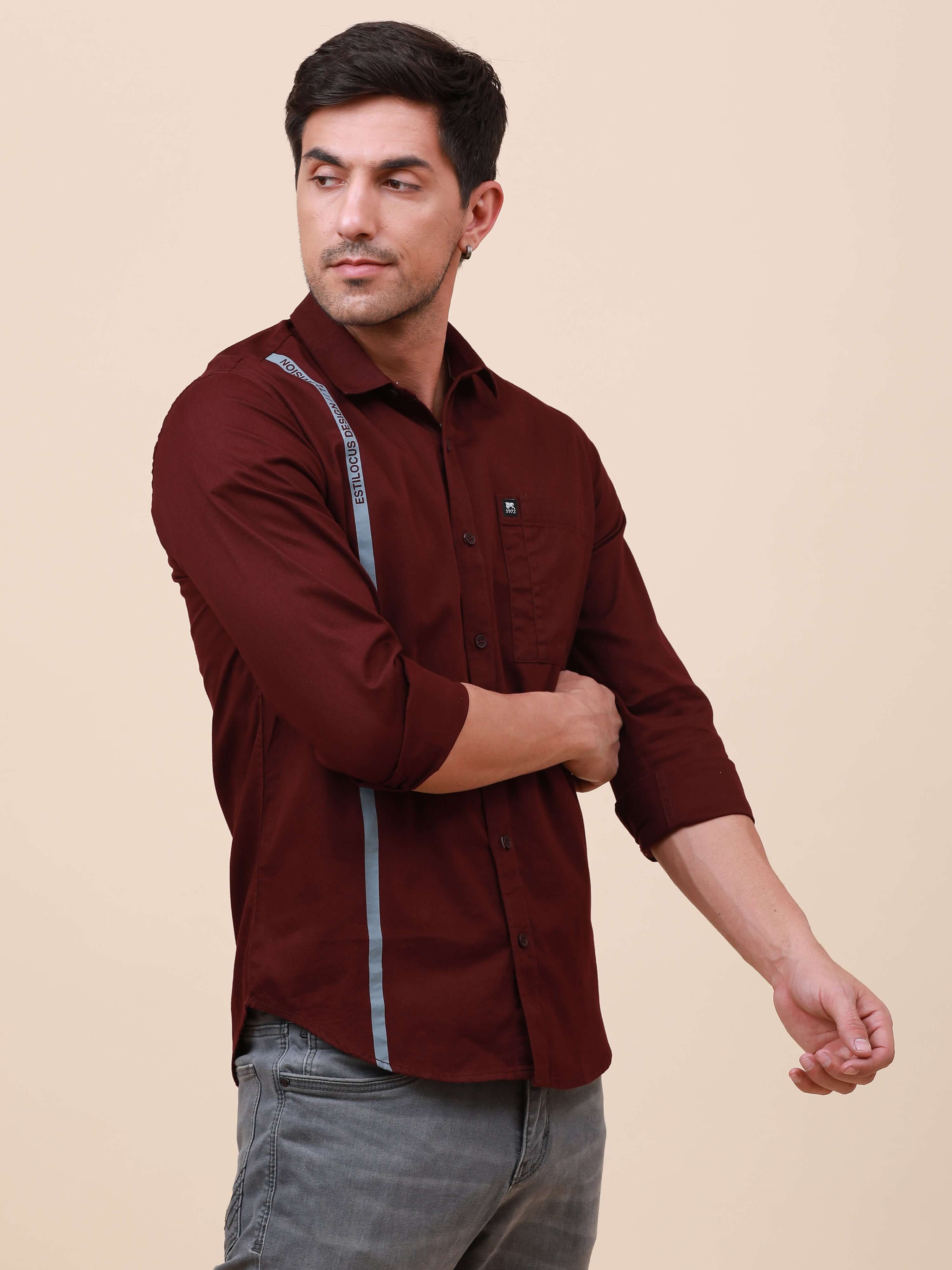Plum Solid Single Pocket Shirt shop online at Estilocus. 100% Cotton ,Full-sleeve solid shirt Cut and sew placket Regular collar Double button edge cuff Single pocket Curved bottom hemline Finest printing at front placket. All double needle construction,