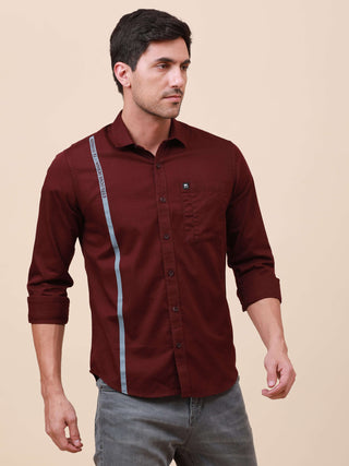 Plum Solid Single Pocket Shirt shop online at Estilocus. 100% Cotton ,Full-sleeve solid shirt Cut and sew placket Regular collar Double button edge cuff Single pocket Curved bottom hemline Finest printing at front placket. All double needle construction,