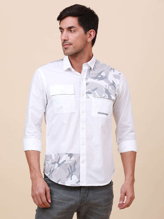 White Camo Solid Single Pocket Shirt shop online at Estilocus. 100% Cotton ,Full-sleeve solid shirt Cut and sew placket. Cut and sew front placket with camo fab Regular collar Double button edge cuff Double pocket with flap Curved bottom hemline Finest pr