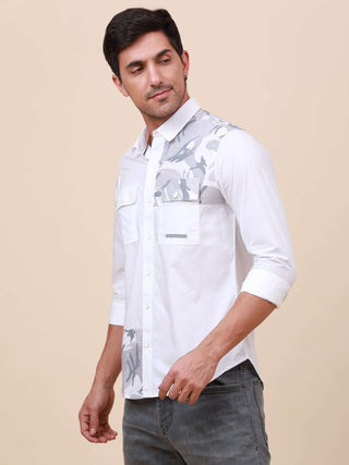 White Camo Solid Single Pocket Shirt shop online at Estilocus. 100% Cotton ,Full-sleeve solid shirt Cut and sew placket. Cut and sew front placket with camo fab Regular collar Double button edge cuff Double pocket with flap Curved bottom hemline Finest pr