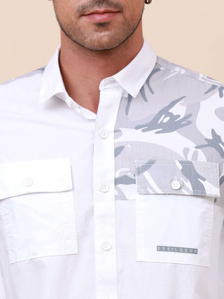 White Camo Solid Single Pocket Shirt shop online at Estilocus. 100% Cotton ,Full-sleeve solid shirt Cut and sew placket. Cut and sew front placket with camo fab Regular collar Double button edge cuff Double pocket with flap Curved bottom hemline Finest pr