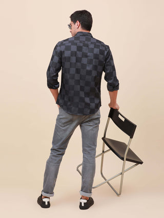 Dark Grey Check Pocketless Shirt shop online at Estilocus. 100% Cotton ,Full-sleeve checks shirt Self fold placket Regular collar Double button edge cuff Pocketless Curved bottom hemline Finest quality brand embroidery at front placket. All sinlge needle