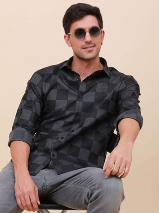 Dark Grey Check Pocketless Shirt shop online at Estilocus. 100% Cotton ,Full-sleeve checks shirt Self fold placket Regular collar Double button edge cuff Pocketless Curved bottom hemline Finest quality brand embroidery at front placket. All sinlge needle