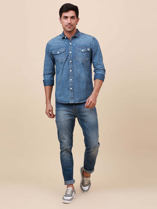 Denim Double Pocket Shirt shop online at Estilocus. Denim, Full-sleeve solid shirt Cut and sew placket Regular collar Double button edge cuff Double pocket with flap Curved bottom hemline All double needle construction, finest quality sewing Machine wash