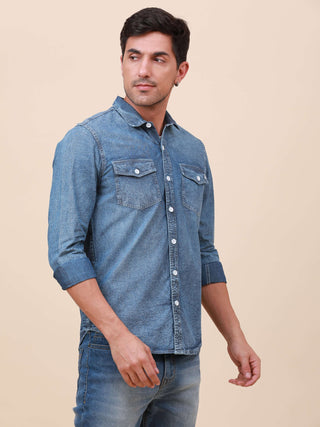 Denim Double Pocket Shirt shop online at Estilocus. Denim, Full-sleeve solid shirt Cut and sew placket Regular collar Double button edge cuff Double pocket with flap Curved bottom hemline All double needle construction, finest quality sewing Machine wash