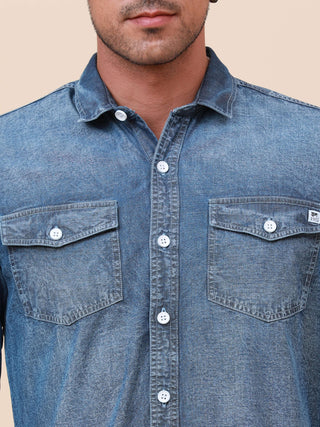 Denim Double Pocket Shirt shop online at Estilocus. Denim, Full-sleeve solid shirt Cut and sew placket Regular collar Double button edge cuff Double pocket with flap Curved bottom hemline All double needle construction, finest quality sewing Machine wash