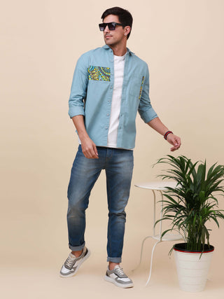 Pale Teal Solid Single Pocket Shirt shop online at Estilocus. 100% Cotton ,Full-sleeve solid shirt Cut and sew placket Regular collar Double button edge cuff Single pocket Curved bottom hemline HD elegant printing at front placket and pocket. All double n