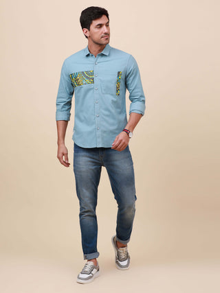 Pale Teal Solid Single Pocket Shirt shop online at Estilocus. 100% Cotton ,Full-sleeve solid shirt Cut and sew placket Regular collar Double button edge cuff Single pocket Curved bottom hemline HD elegant printing at front placket and pocket. All double n